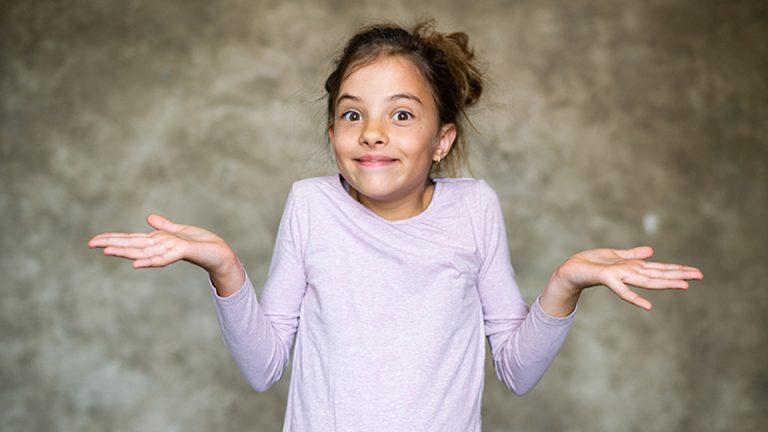 Girl gesturing with palms up